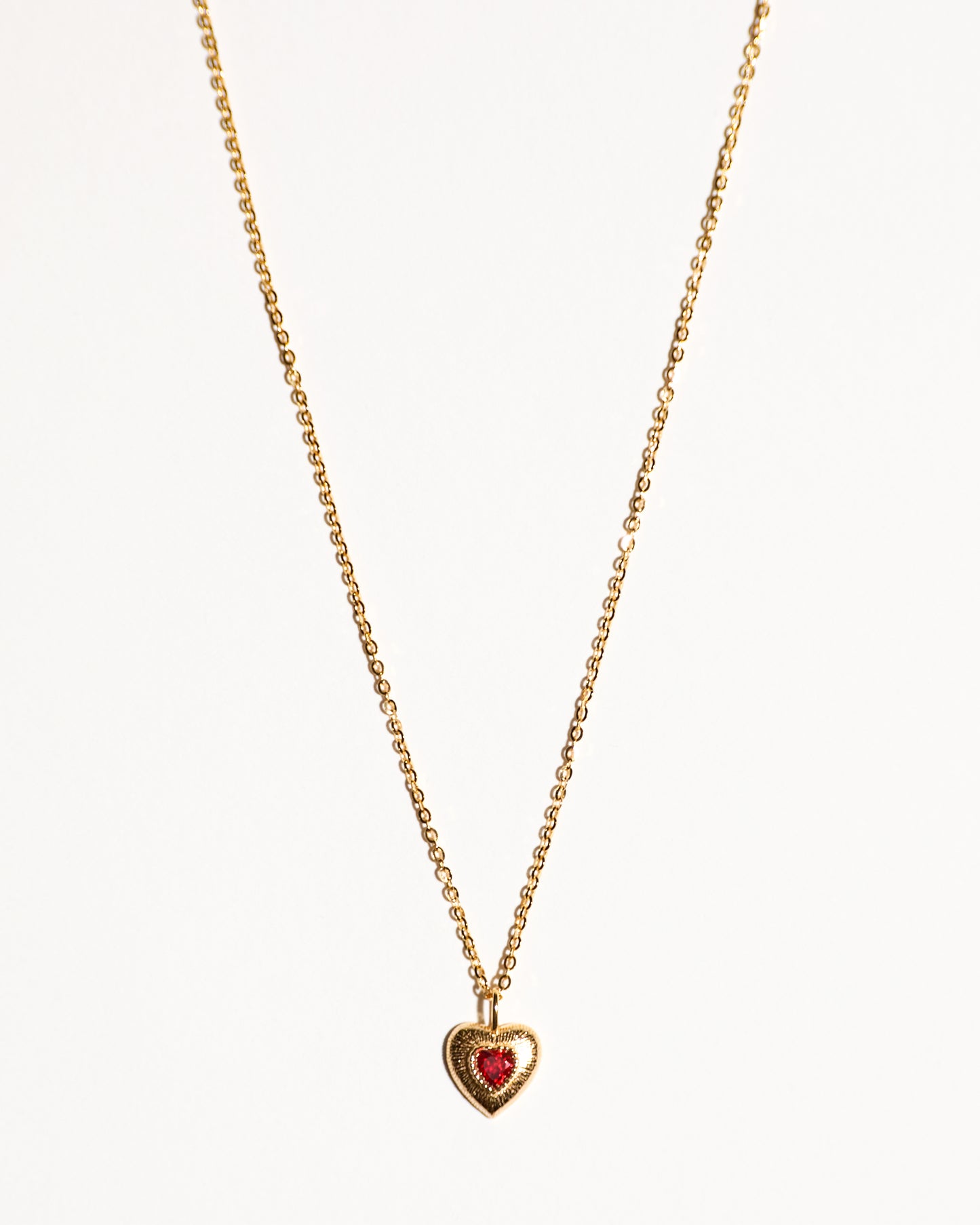 Gold Heart with Ruby Centerpiece Necklace